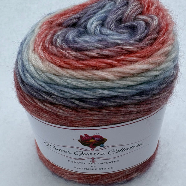 Multicolored yarn skein with a label on a white background