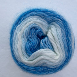 Blue and white yarn skein on a light gray background