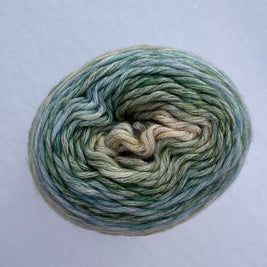Multicolored yarn skein on a light gray background