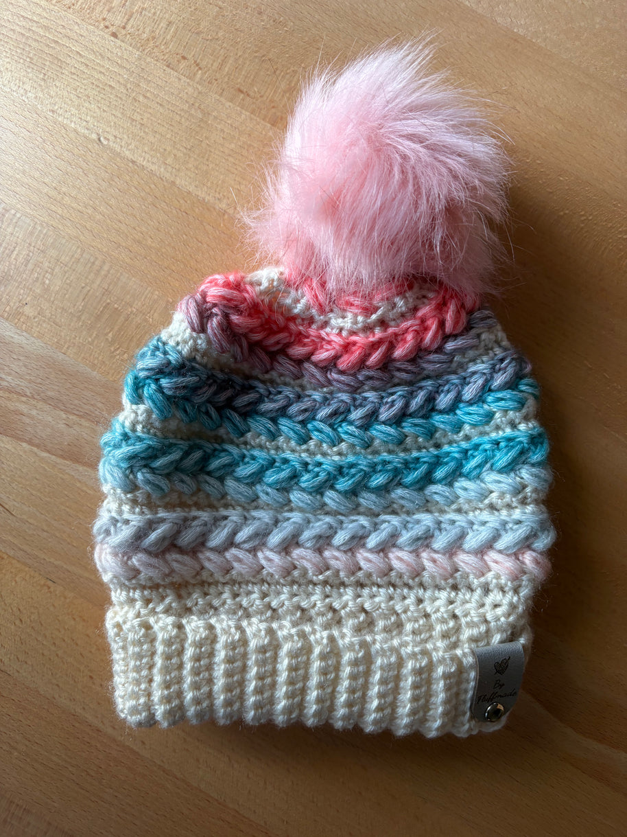 Pastel blue and coral crochet toque with pink faux fur pom – handmade winter hat by Fluffmade.