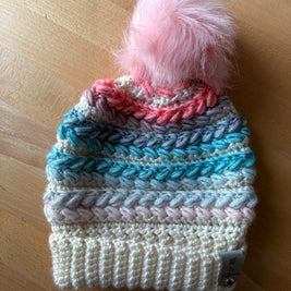 Pastel blue and coral crochet toque with pink faux fur pom – handmade winter hat by Fluffmade.