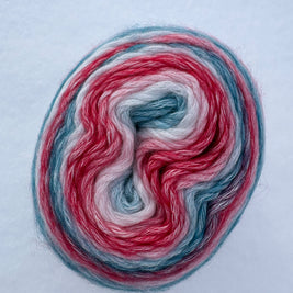 Multicolored yarn skein on a light gray background