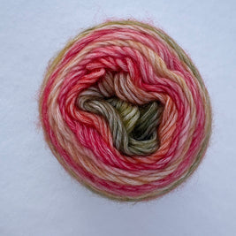 Multicolored yarn ball on a light gray background